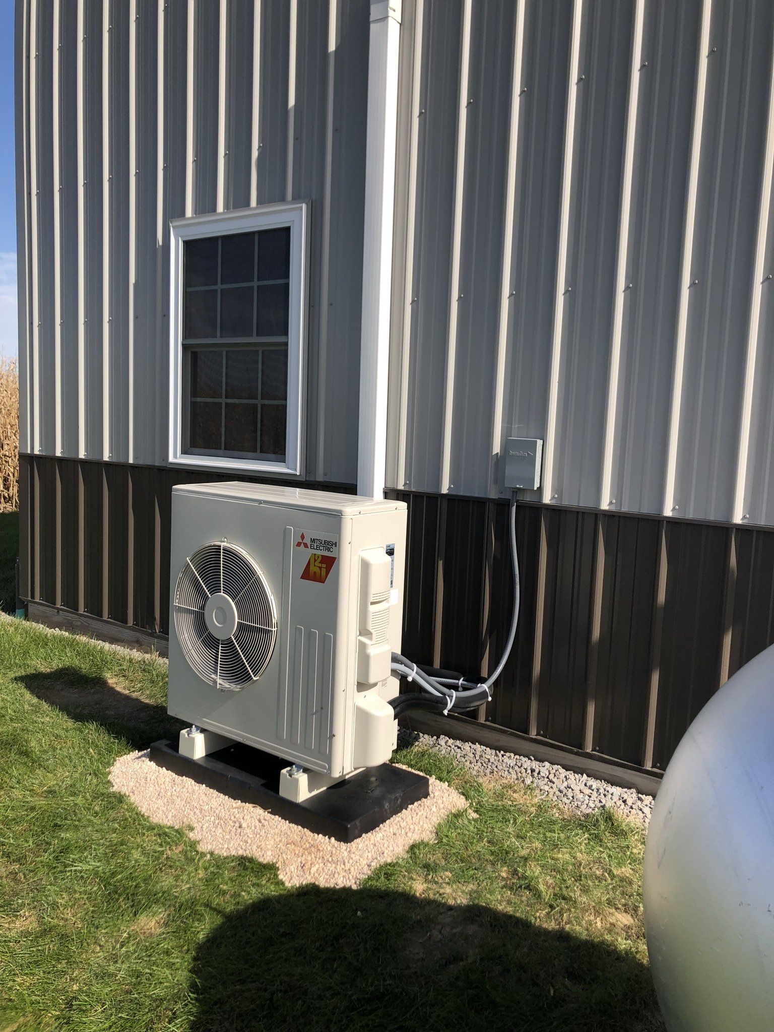 Big White Air Conditioner Inverter — Spencerville, OH — Matt’s Heating & Cooling LLC