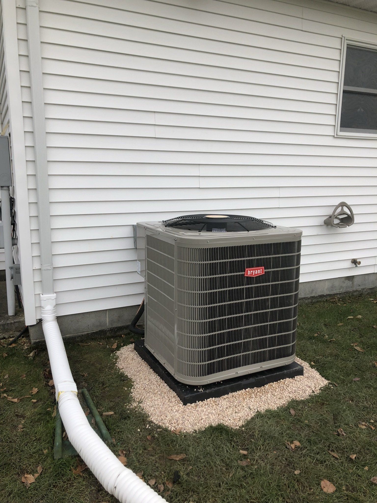 Newly Installed Gray Heat Pump Outdoors — Spencerville, OH — Matt’s Heating & Cooling LLC