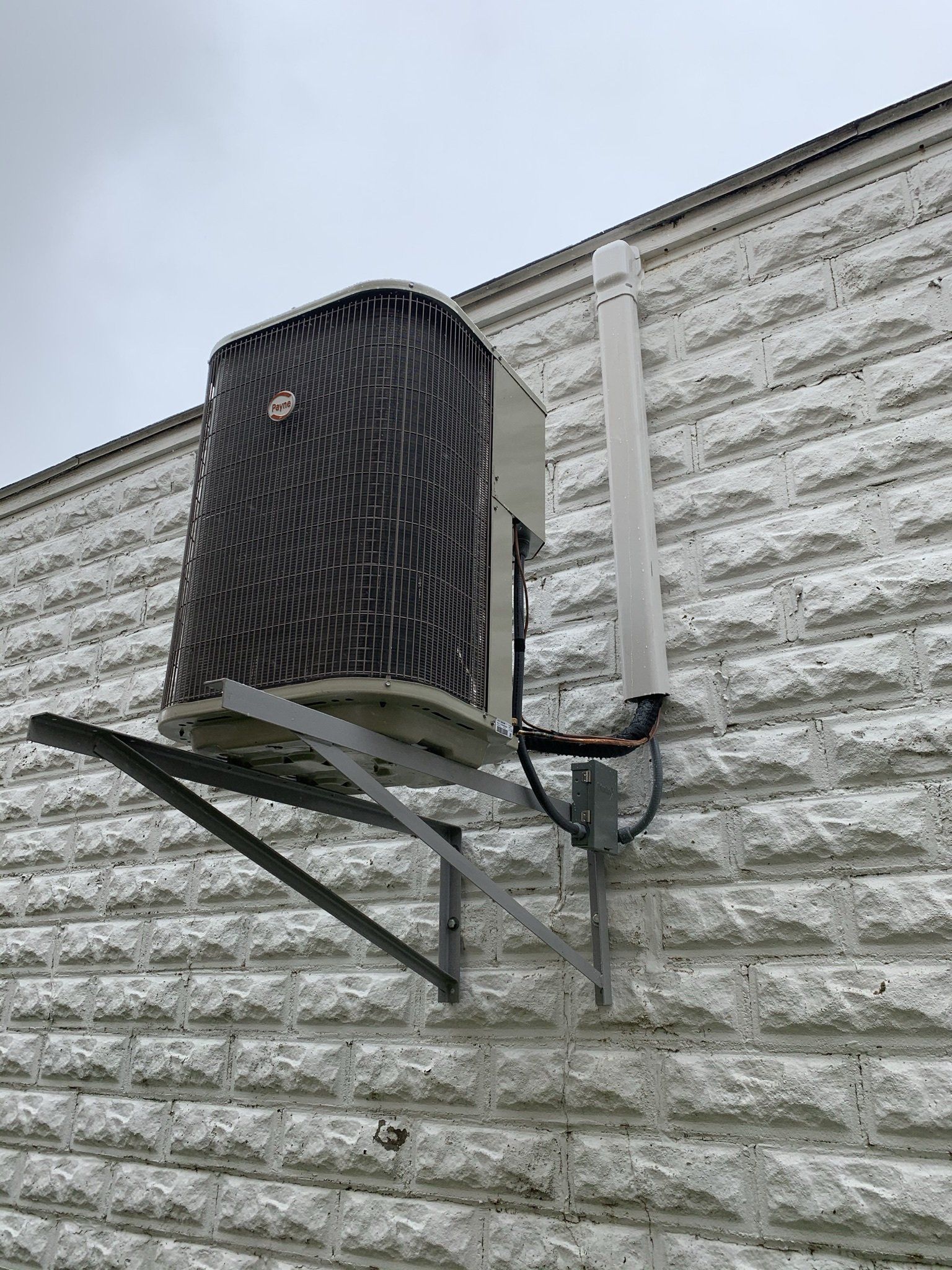 Heat Pump Embedded on a Wall — Spencerville, OH — Matt’s Heating & Cooling LLC