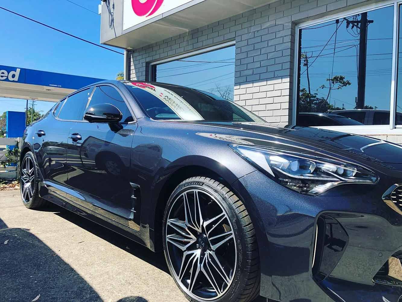 A Black Car is Parked in Front of a Gas Station — Endrust (Coffs Harbour) in Coffs Harbour, NSW