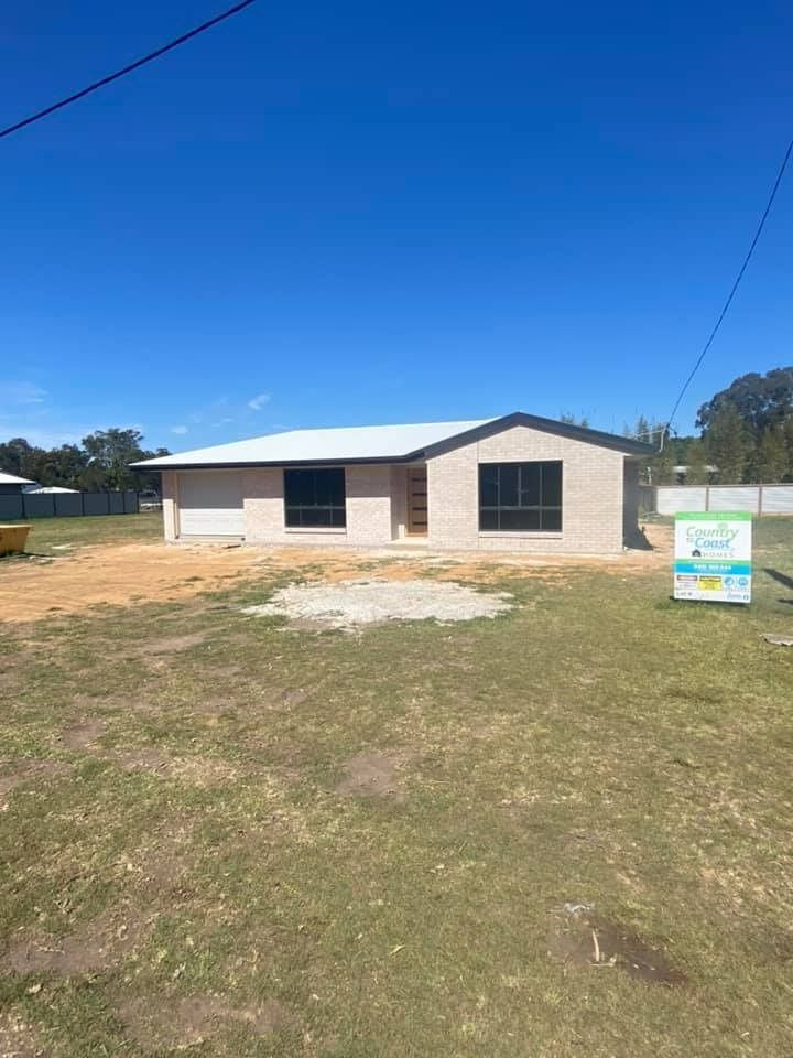 A Single-Story House with A Brick Facade Under Construction — Country to Coast Homes In Gregory River, QLD