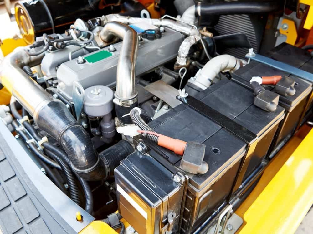 A Close Up of the Engine of a Yellow Forklift — Wyong Radiator Repairs In Lake Haven, NSW