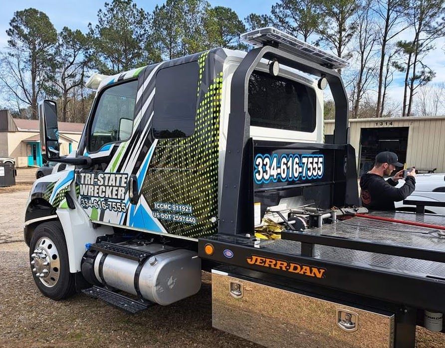 full custom printed commercial wrap on cab with white, blue, green and black graphics