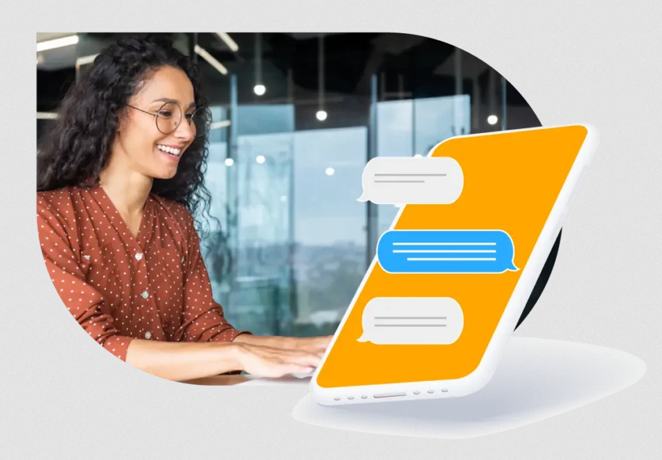 Woman smiling at a laptop beside a bright orange chat interface icon
