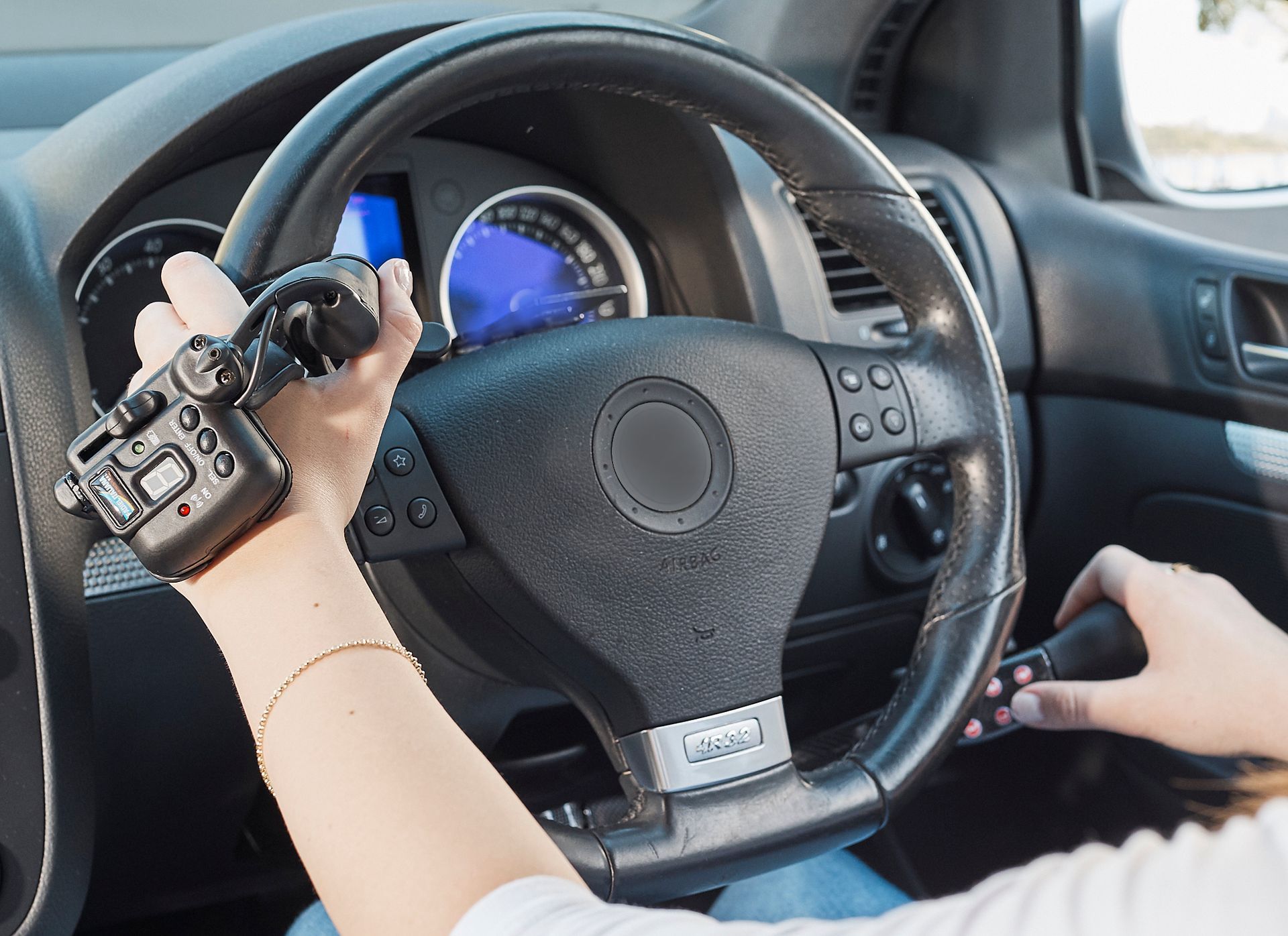 A Steering Wheel With Hand Controls — Mobility Modification Services In Garbutt, QLD