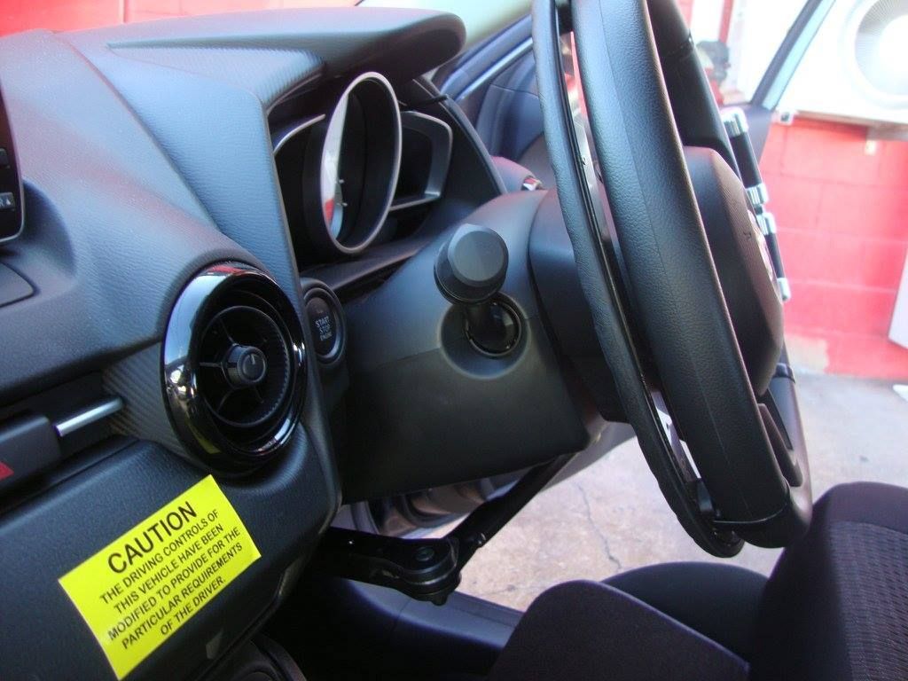 A Steering Wheel With A Ghost Ring — Mobility Modification Services In Garbutt, QLD