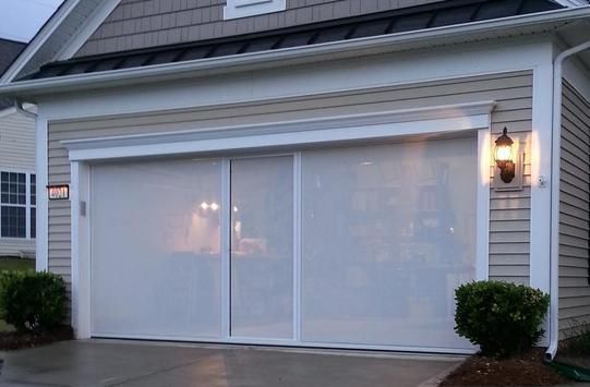 A house with a white Screened garage