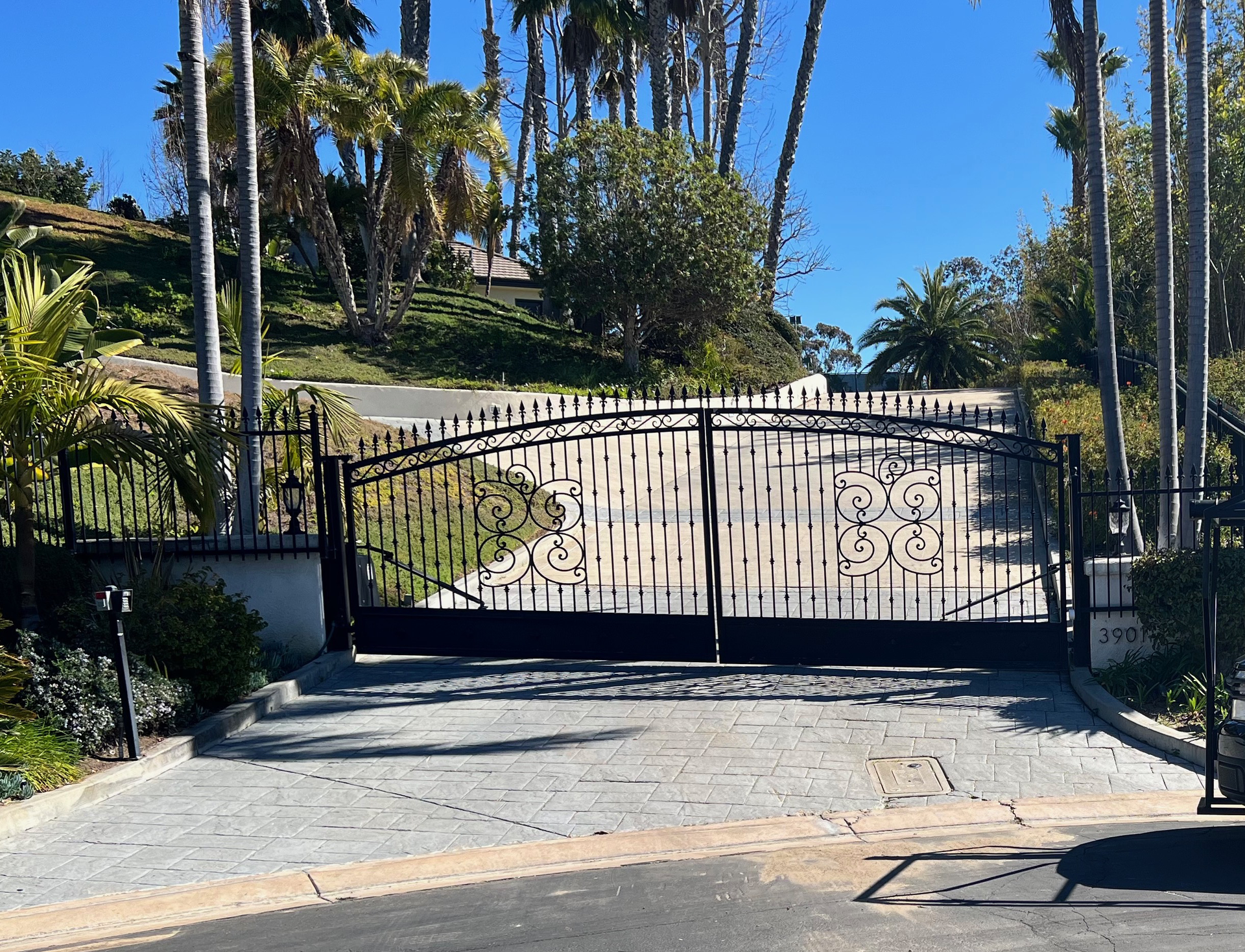 A wrought iron gate with the number 290 on it
