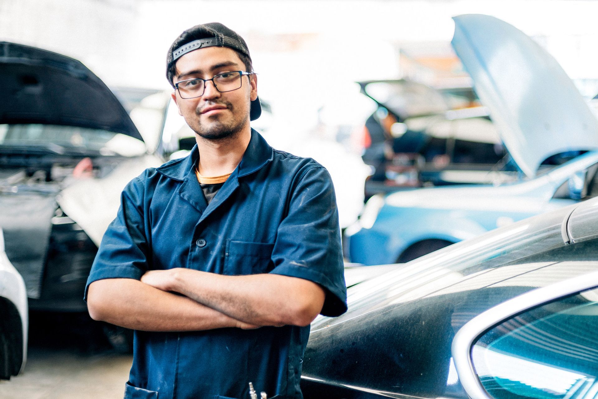 Car Mechanic in Auto Repair Shop — Des Plaines, IL — Schimka Auto Wreckers Inc