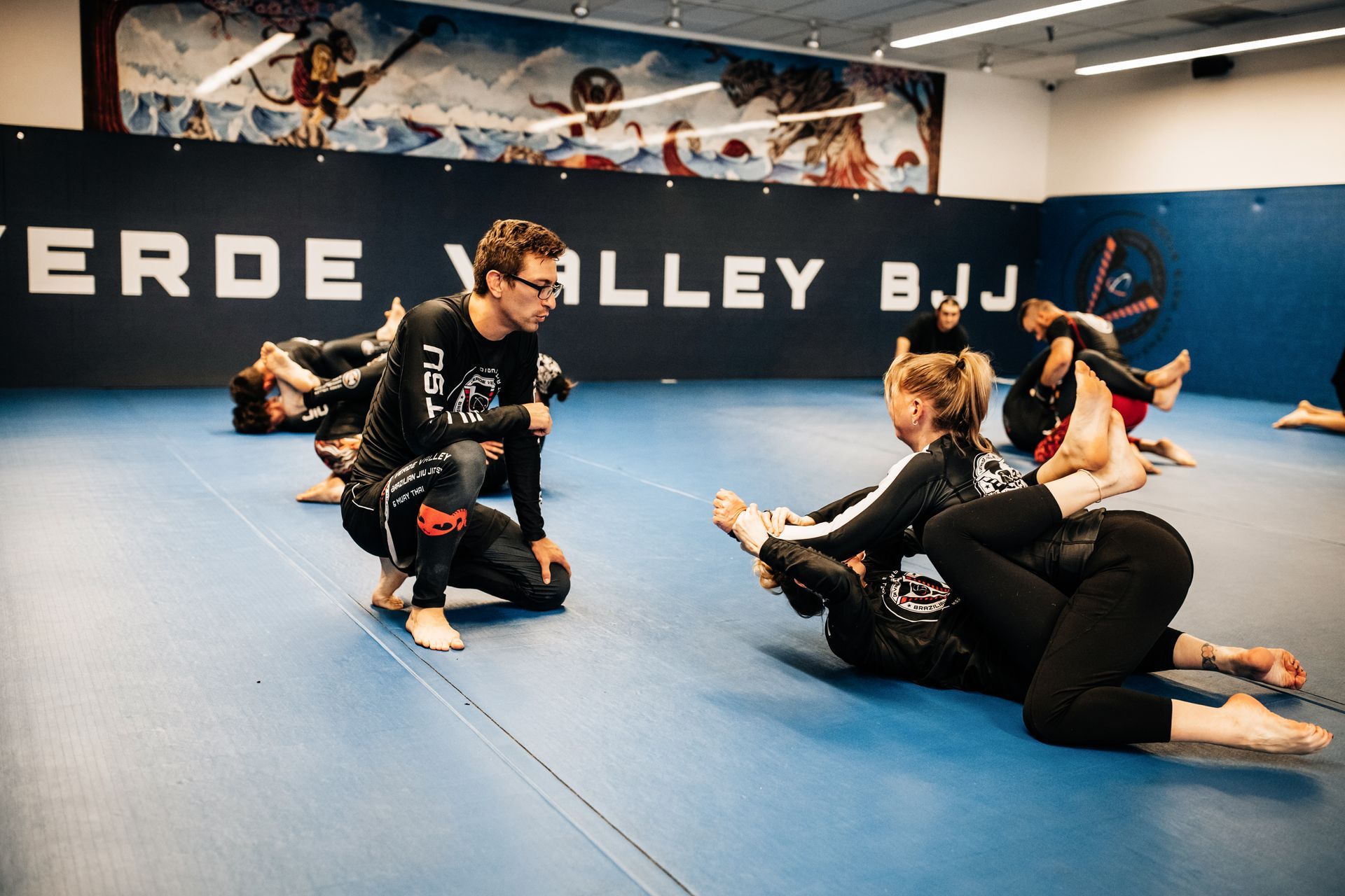 Adults drilling Brazilian Jiu Jitsu at Verde Valley Brazilian Jiu Jitsu and Muay Thai in Cottonwood, AZ for calmer focus.