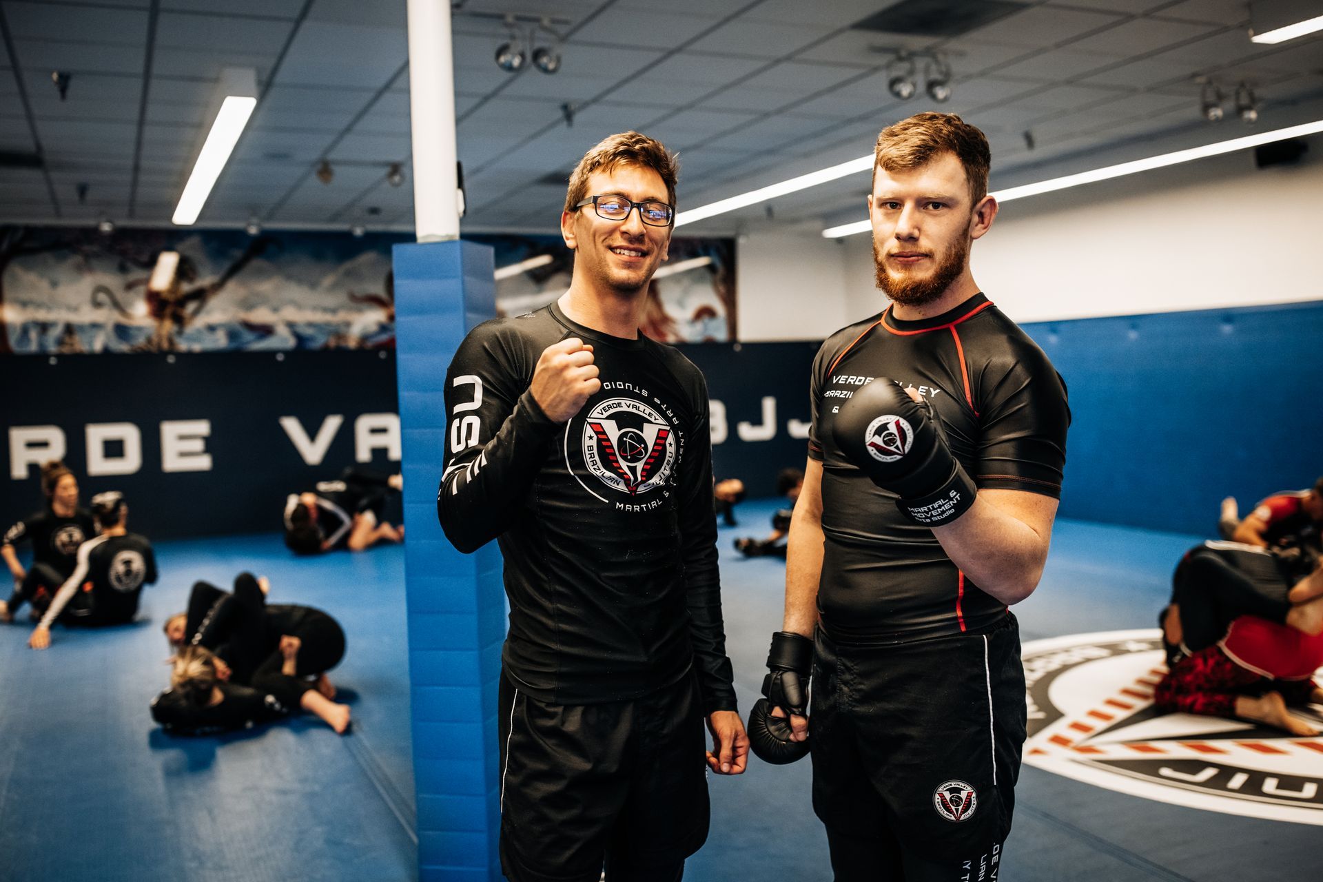 Adults training Muay Thai pads at Verde Valley Brazilian Jiu Jitsu and Muay Thai in Cottonwood, AZ.