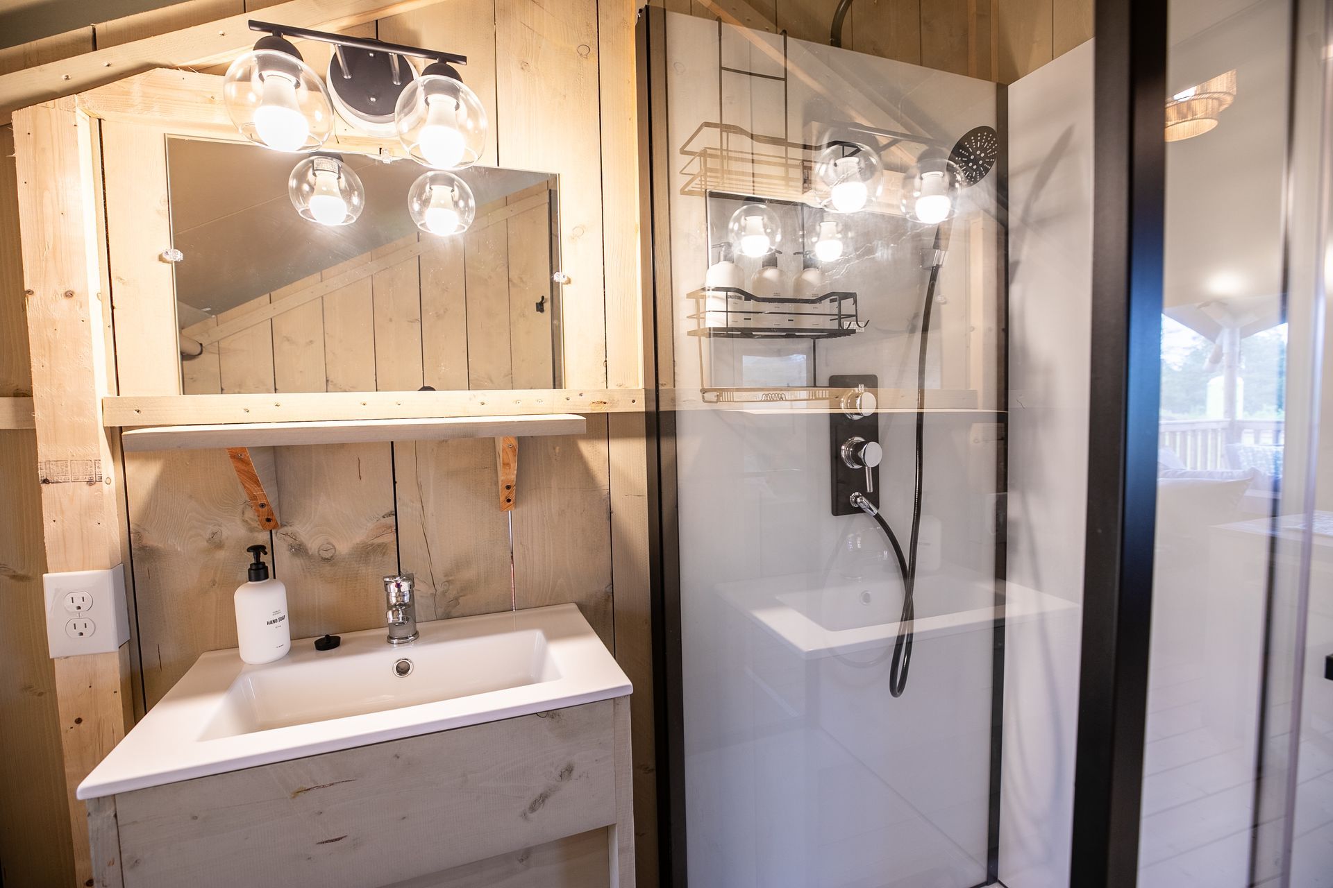 Interior bathroom photo inside a canvas cabin glamping unit at Clay Cosmos in Lumpkin Georgia.