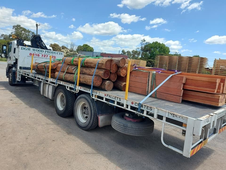 Logs and Timber Ready to Transport — DGW Wood Products in Kurri Kurri, NSW