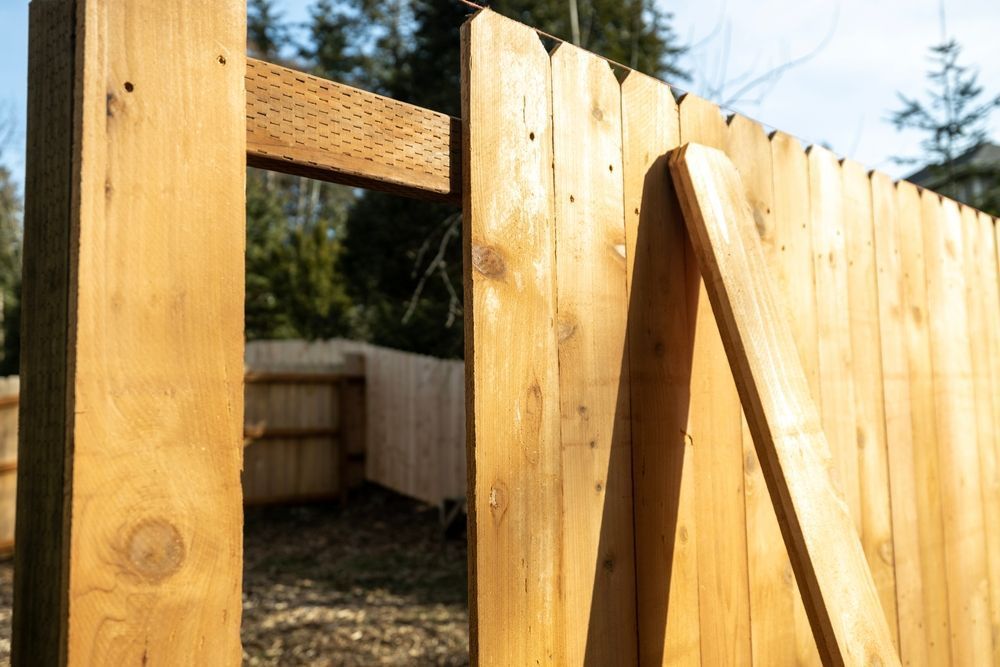 Cedar Wood Fence With Missing Boards — Timber Suppliers in Newcastle, NSW