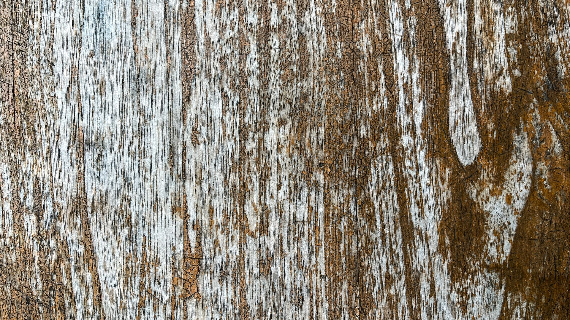 Weathered wood grain, vertical streaks of brown and silver. Weathered wood grain, vertical streaks of brown and silver.