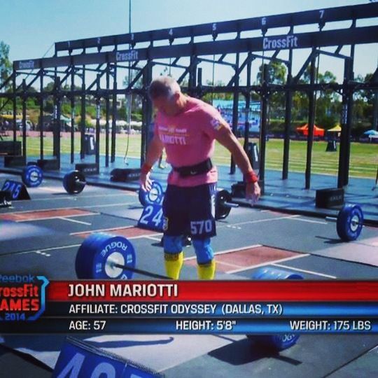 A man with the name john mariotti on his shirt