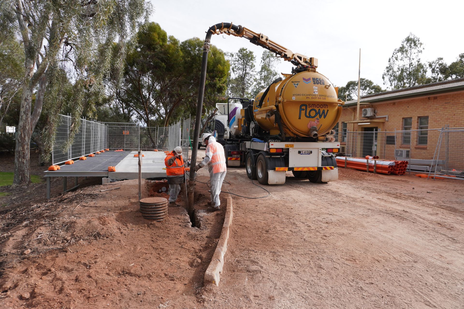 Vacuum potholing to expose an underground utility before excavation