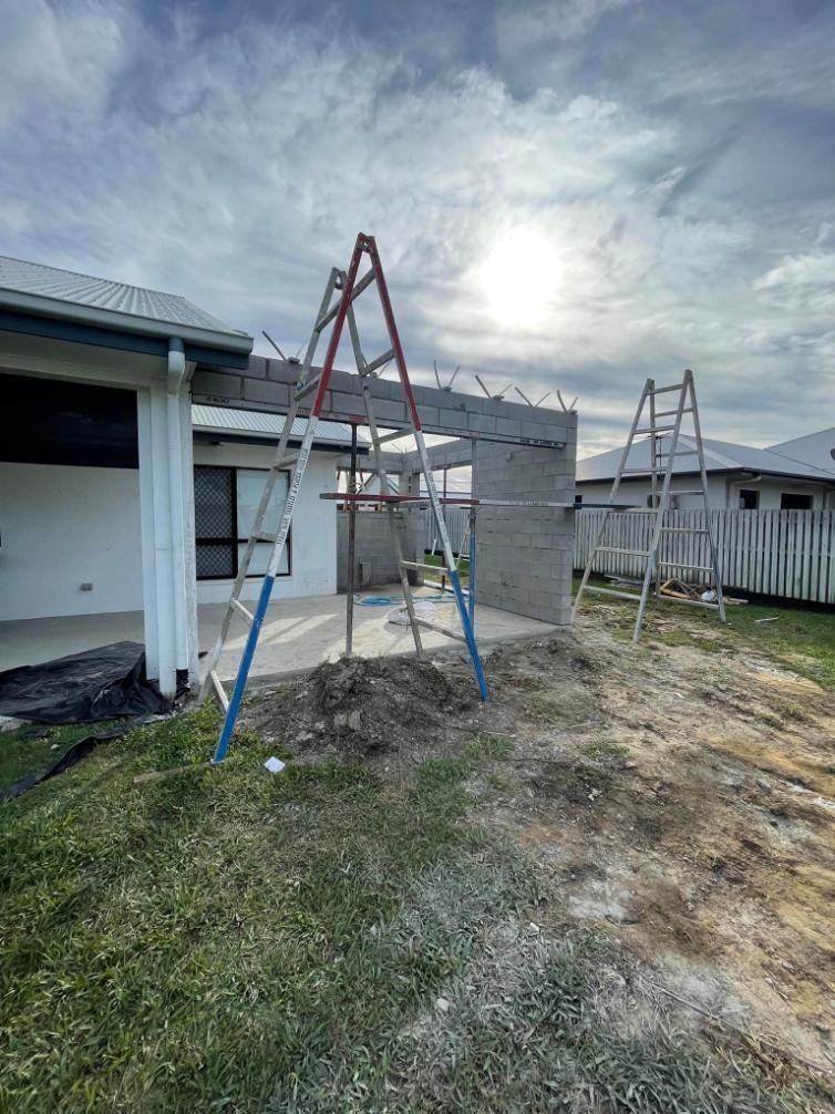 A Ladder is Sitting in Front of a House Under Construction โ Wilkinson Homes in Annandale, QLD