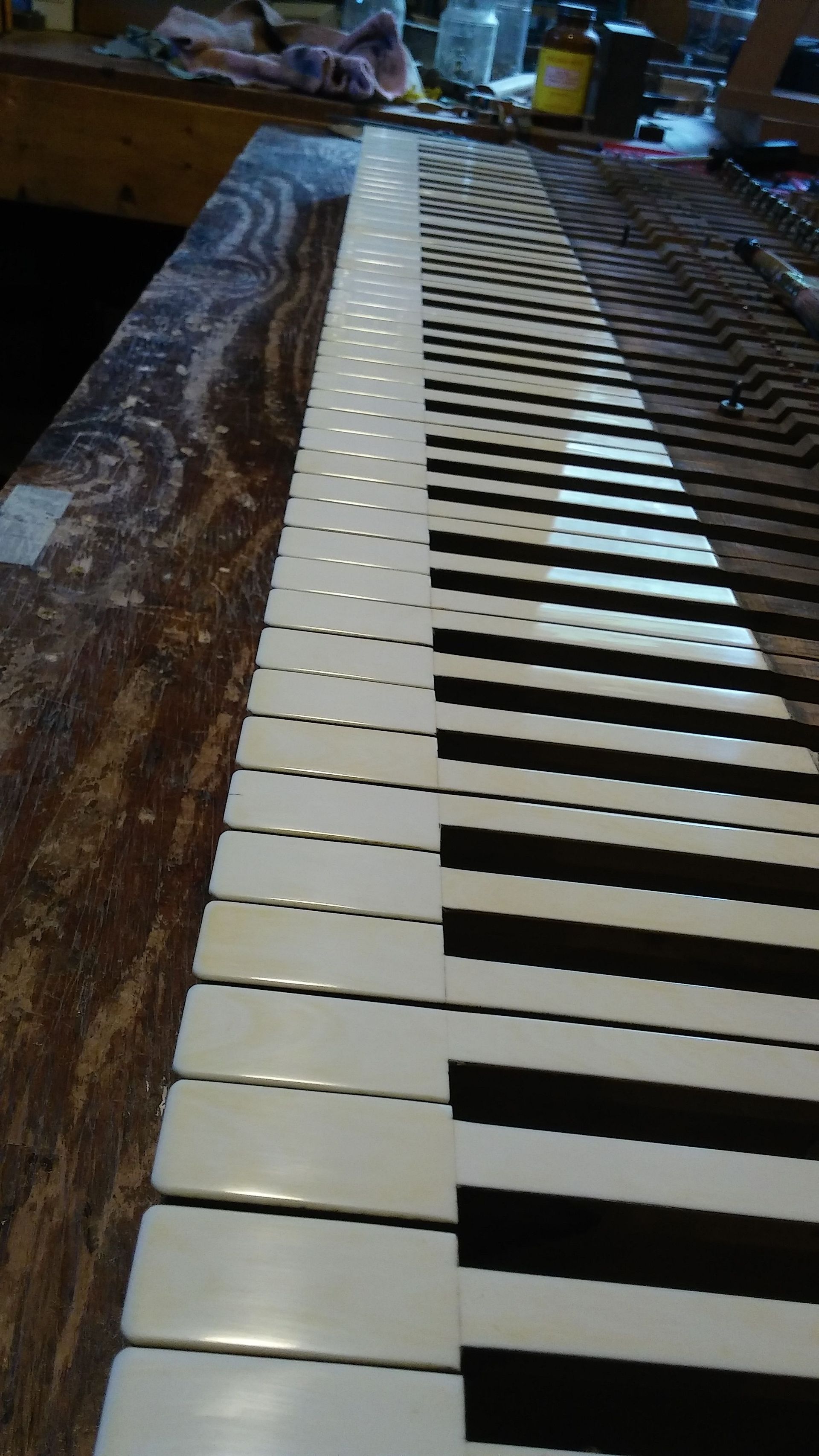 A Piano Keyboard Is on Top of a Wooden Table — Oro Valley, Arizona — Dfusco Piano LLC