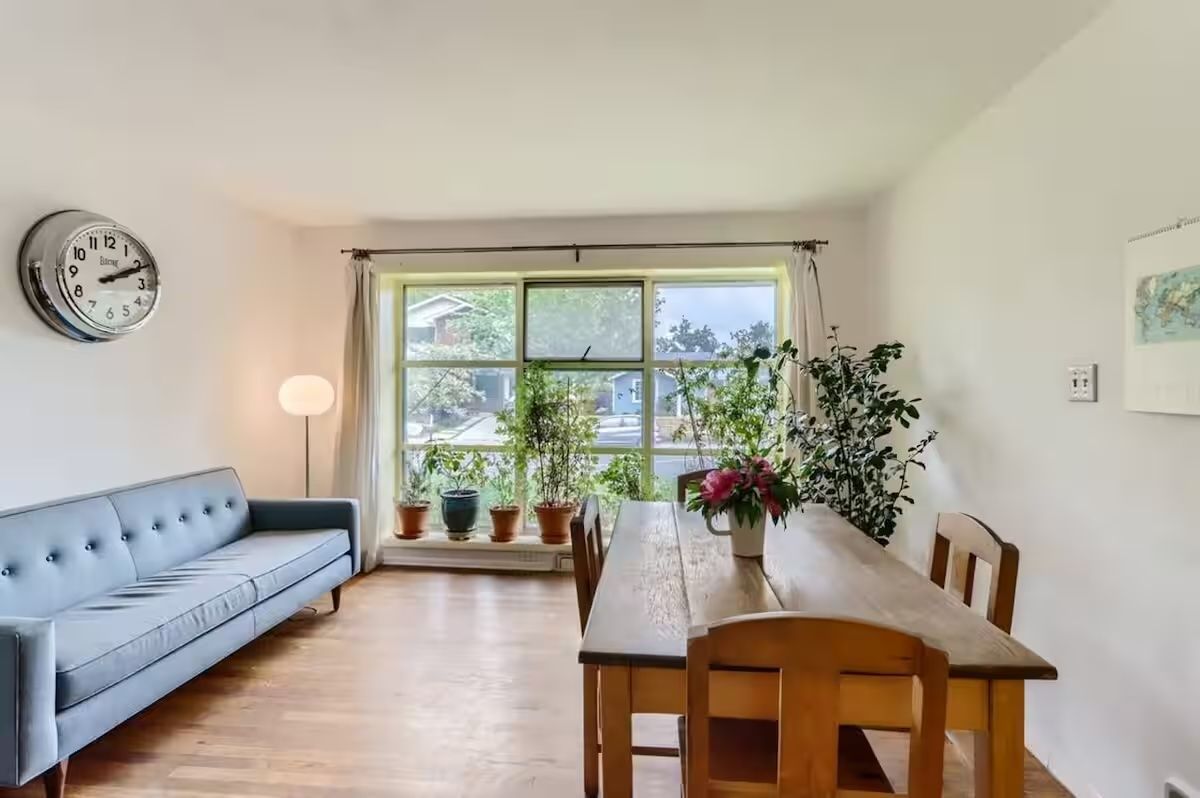 bright living room with farmhouse table