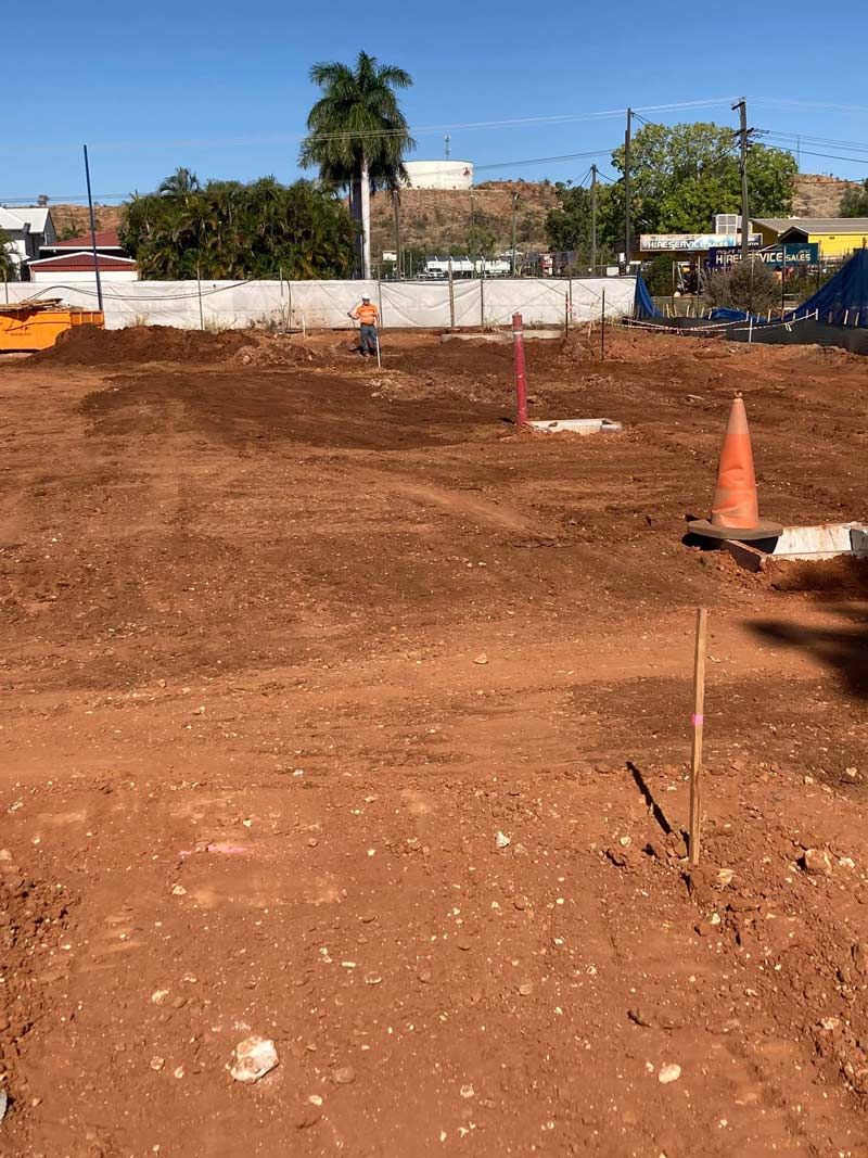A Construction Site With A Cone And A Shovel — NQES Industries in Ryan, QLD