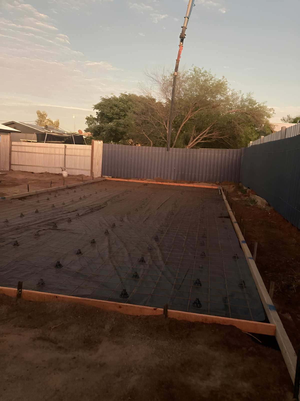 Building Concrete Slab In A Backyard — NQES Industries in  Mount Isa, QLD