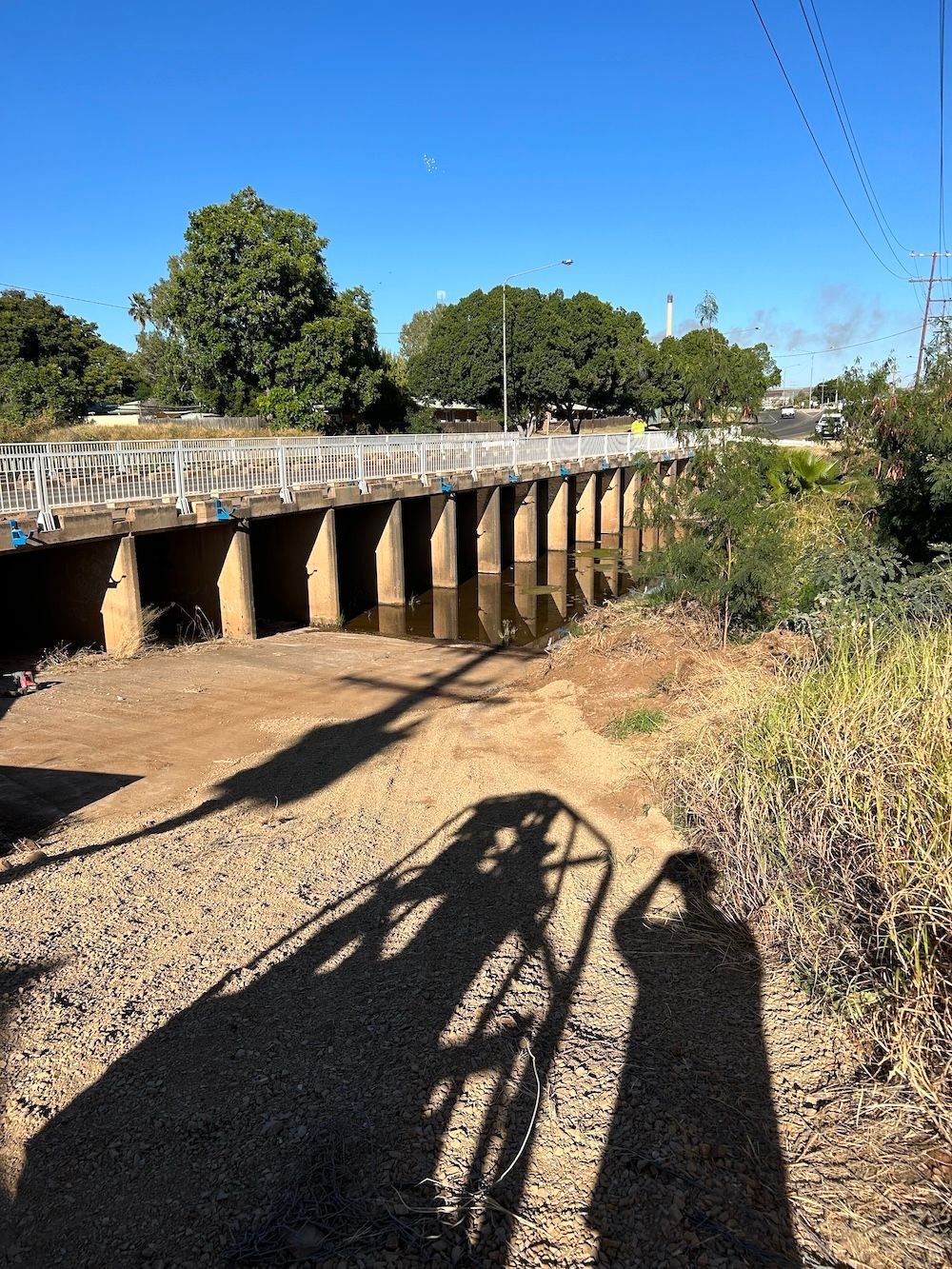 A bridge with water underneath — NQES Industries in Ryan, QLD