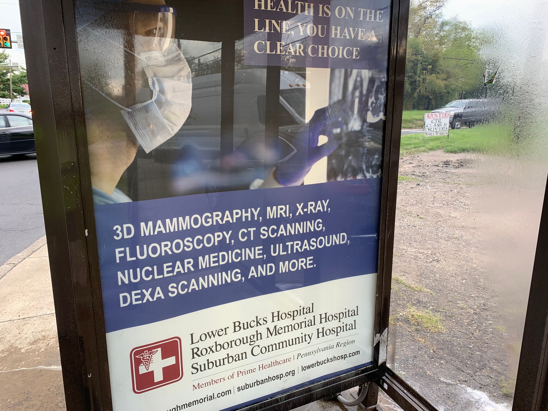Advertisement for Lower Bucks Hospital with medical imaging services listed.