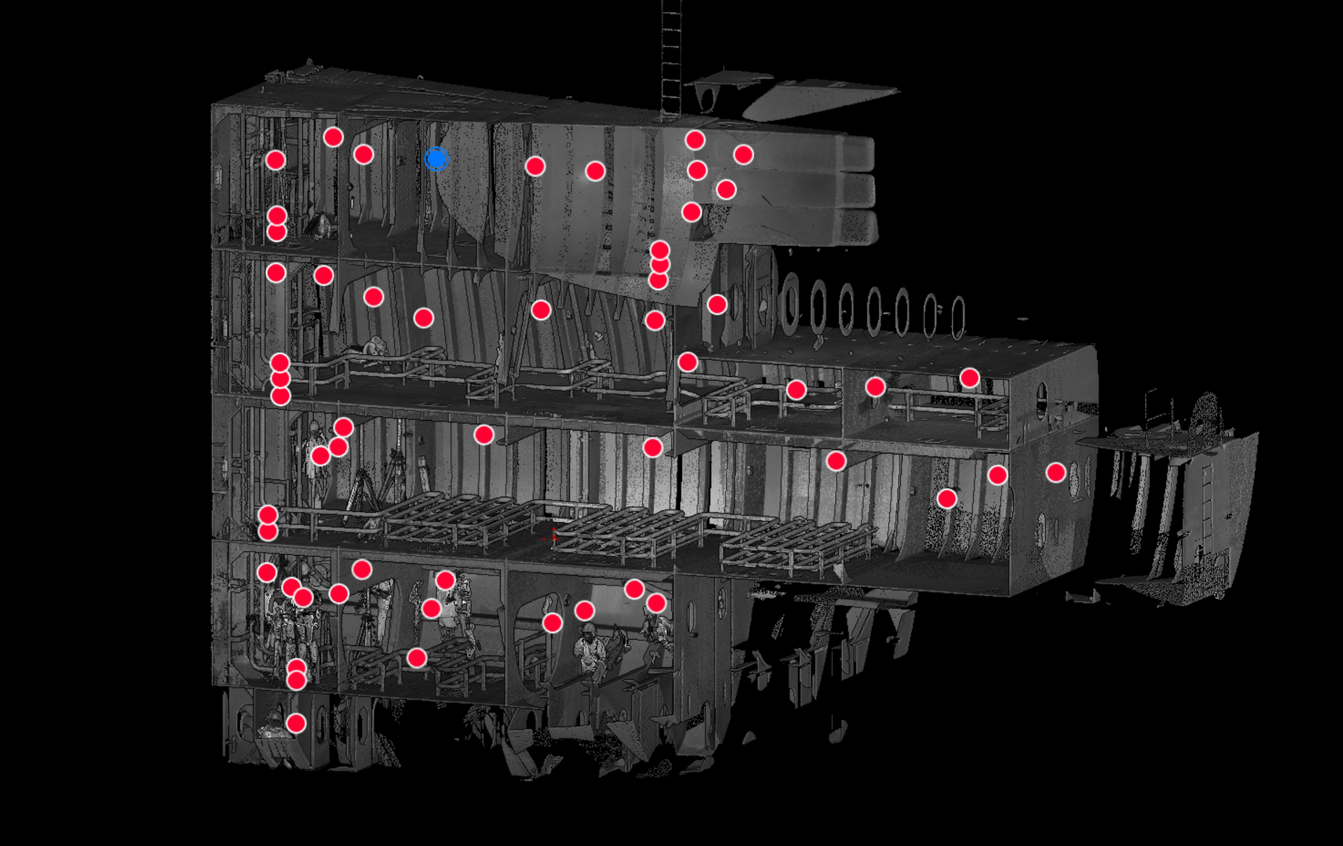 3D scan of a dark building facade with many red landmark points marked across it