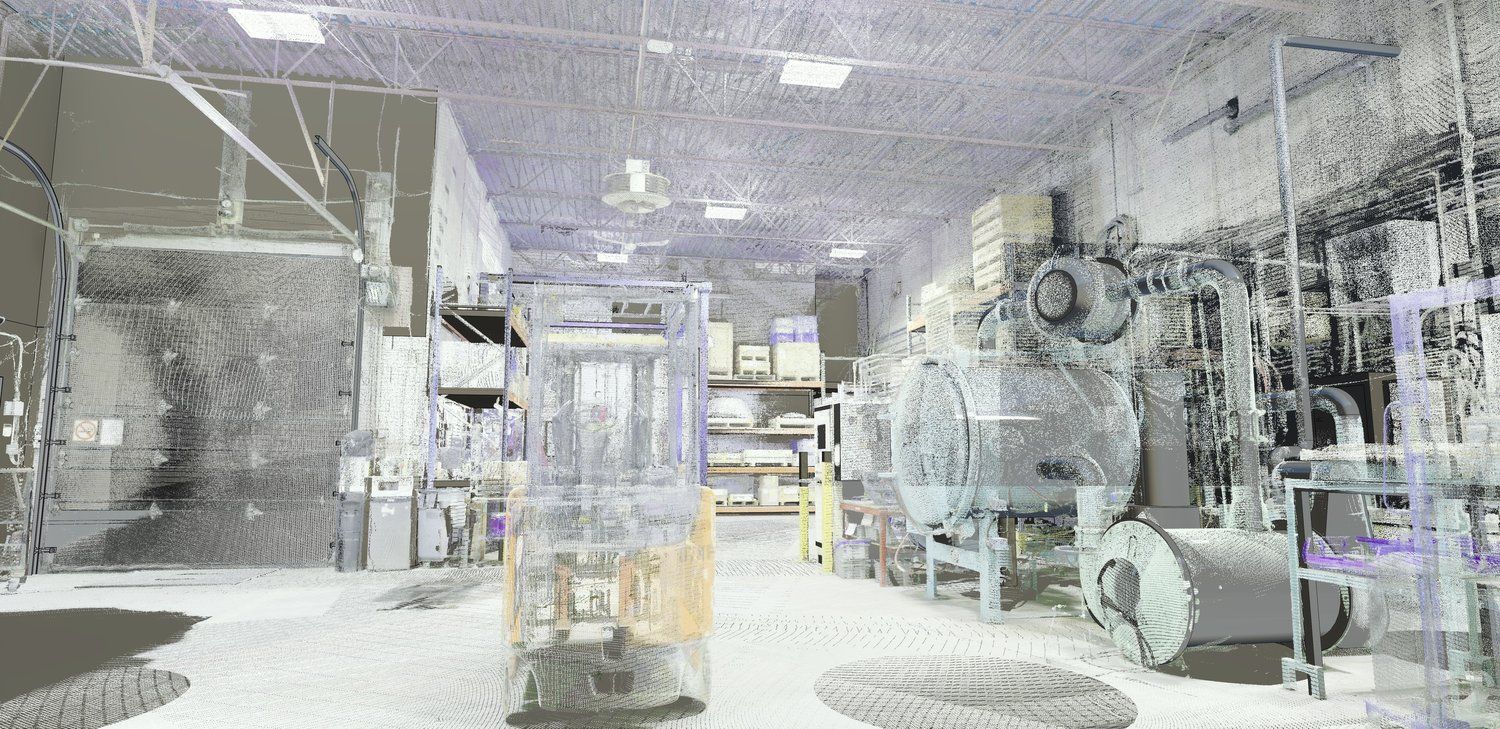 Industrial lab interior with machinery, glass tanks, and metallic equipment in a bright room