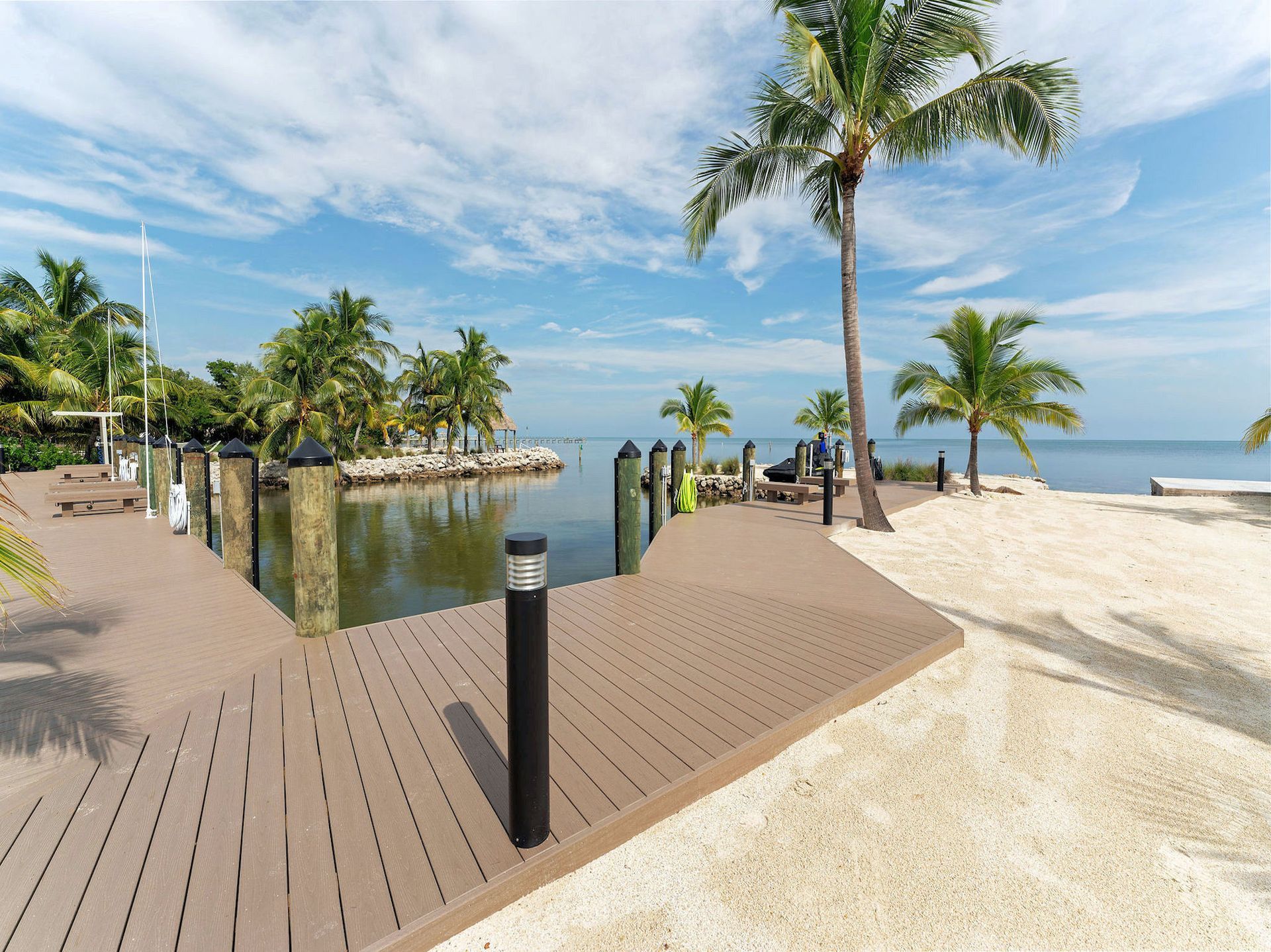 Private Marina, one of the many amenities of The Oasis in Islamorada, Florida is  offered for Sale by THE FIRM REALTY GROUP. 