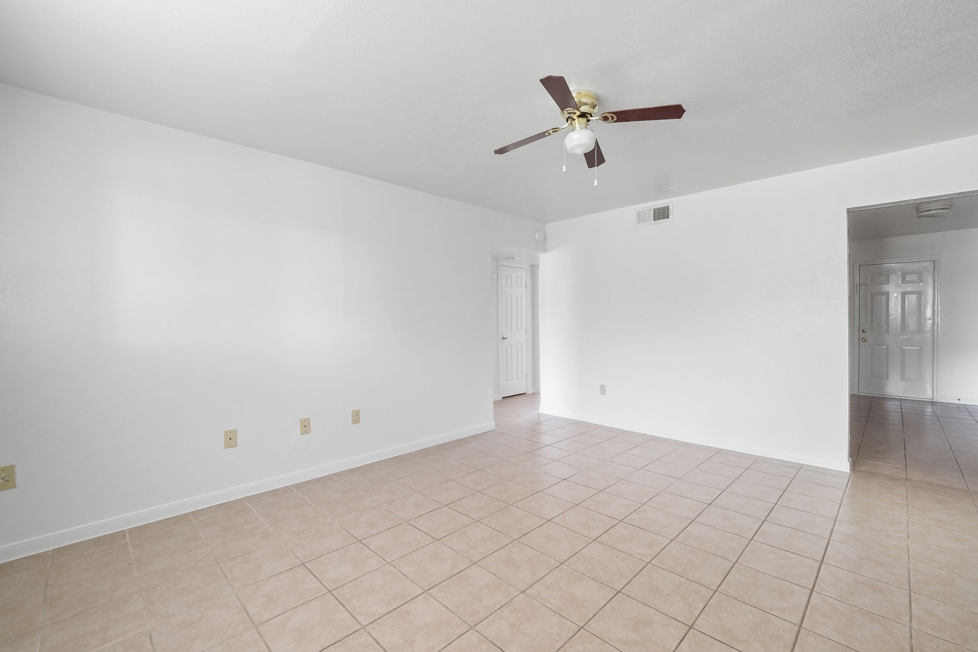 Interior Photo of Empty Room with Ceiling Fan