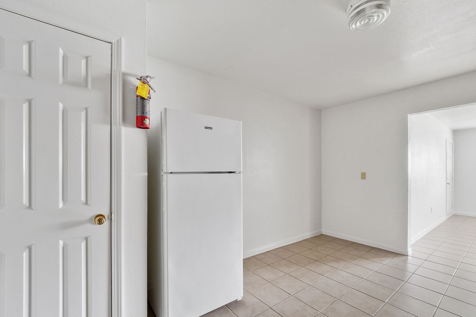Interior Photo of Kitchen with White Fridge
