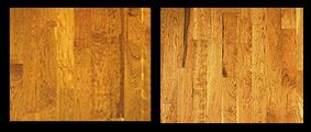 Two panels of wood flooring, golden-brown with a black border.