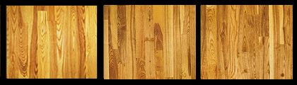 Three square wooden panels, arranged side by side, with vertical wood grain in varying shades of brown and yellow.
