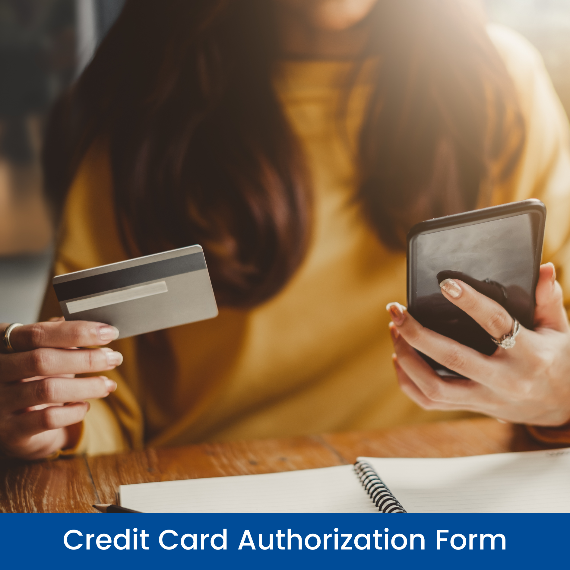 a woman is holding a credit card and a cell phone .