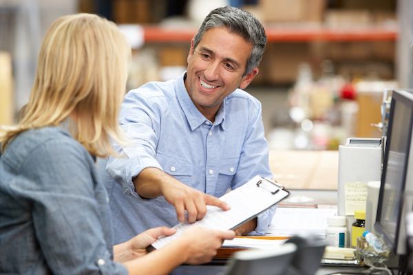 Man pointing out something on paper | Elgin, IL | 'I' in Team Series By IA Business Advisors