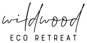 Wildwood Eco Retreat logo in black script.