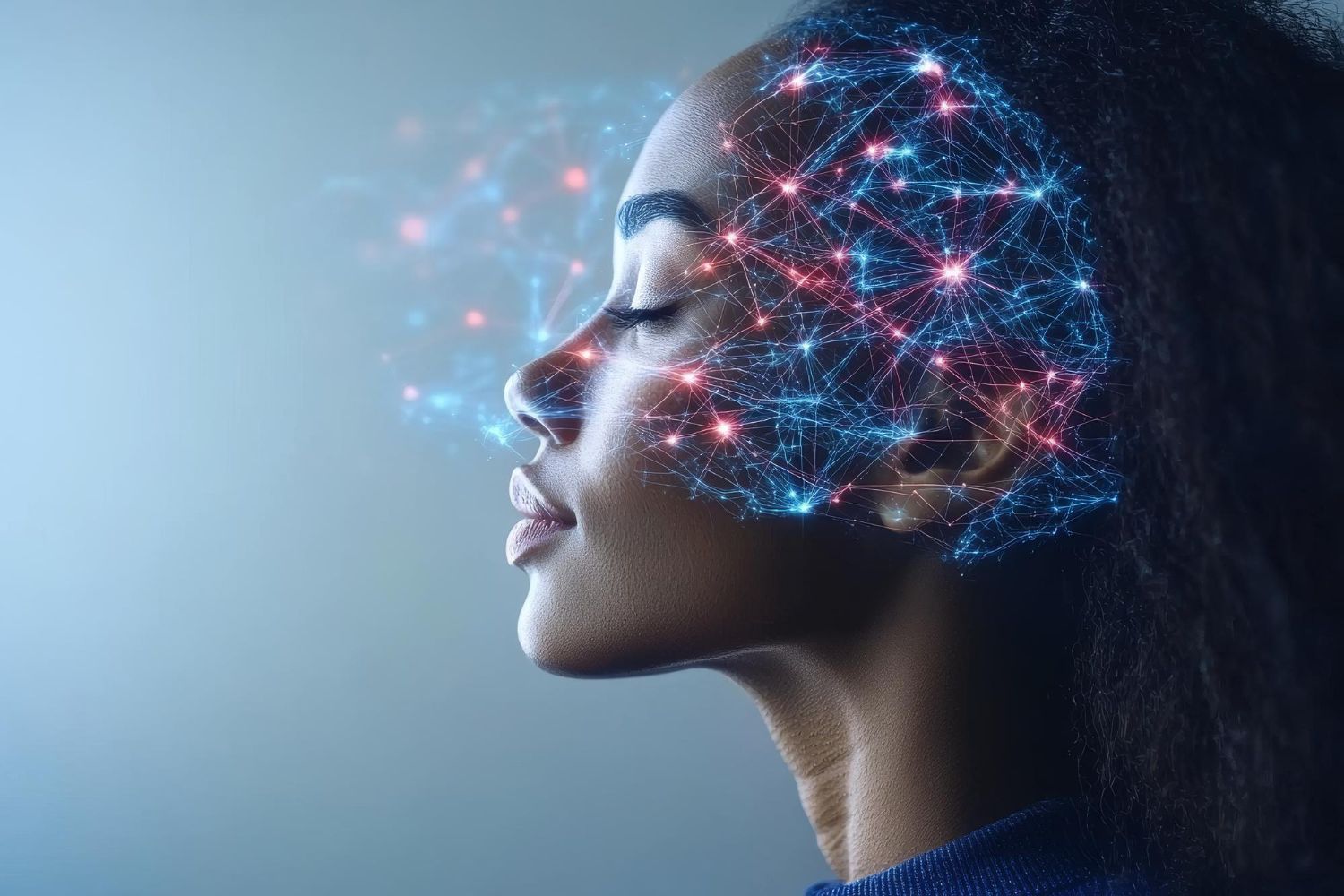 Profile of a woman with a glowing digital network overlay on her head against a blue background