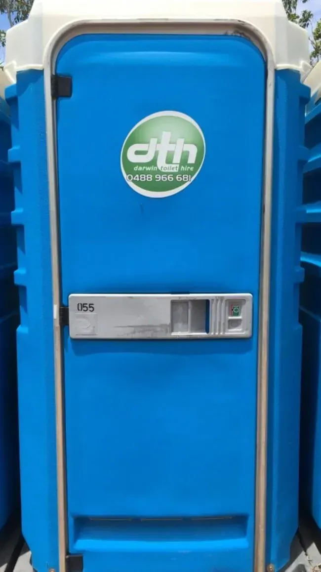 Blue Portable Toilet With a Green Logo and a Silver Flush Panel — Darwin Toilet Hire in Rosebery, NT