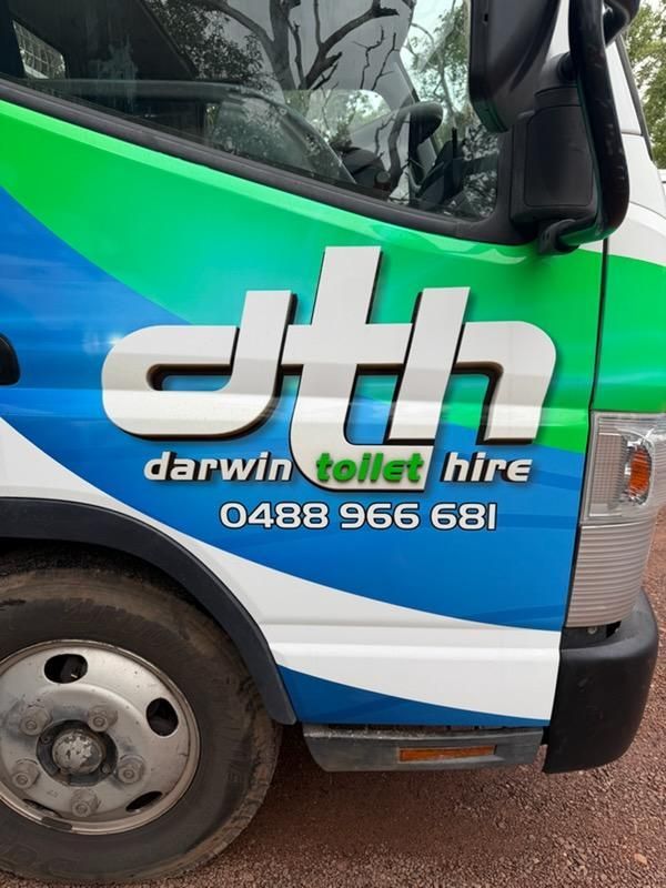 Darwin Toilet Hire Van Side Panel With Green, Blue, and White Branding — Darwin Toilet Hire in Rosebery, NT