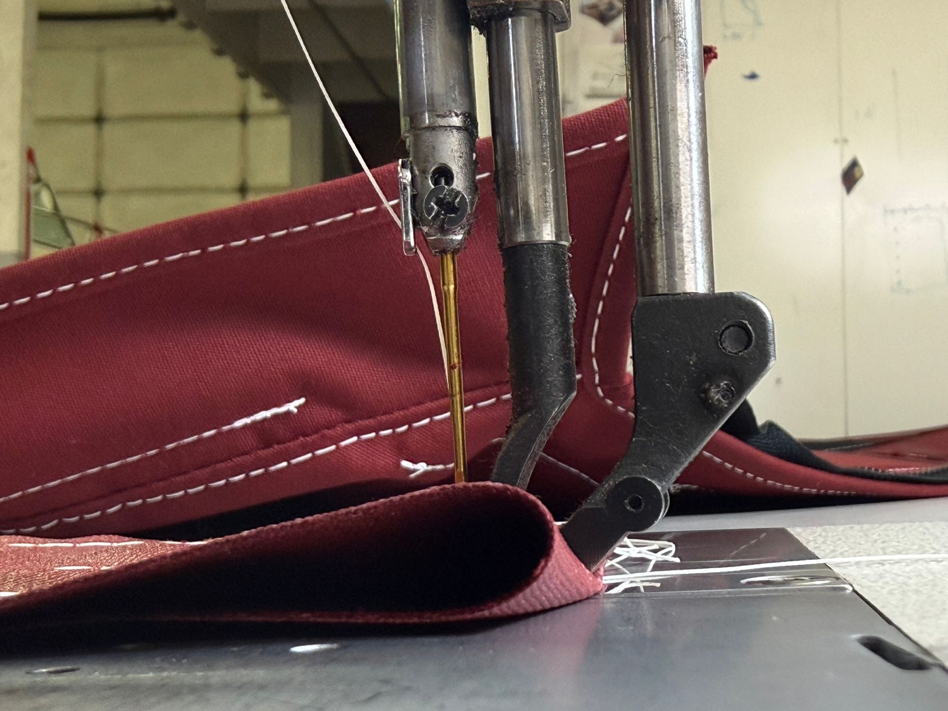 Close-up of canvas stitching on a ProSEAK industrial sewing machine