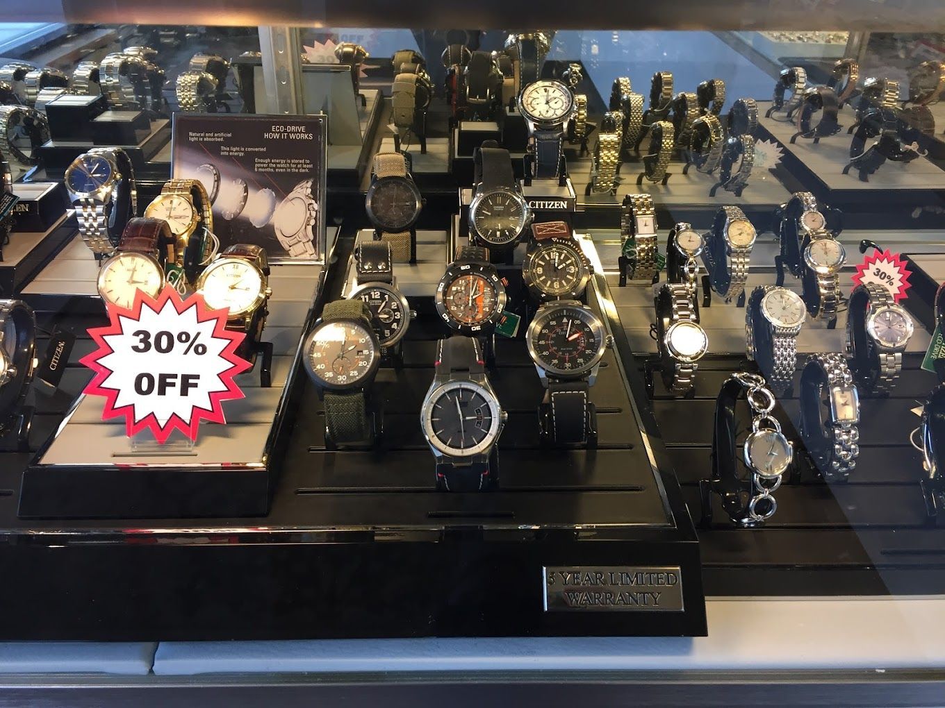 a display of estate jewelry including necklaces and rings