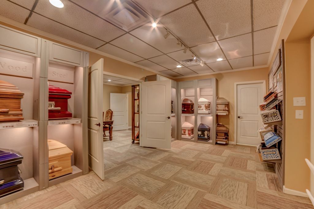 A large room with a lot of luggage in it.
