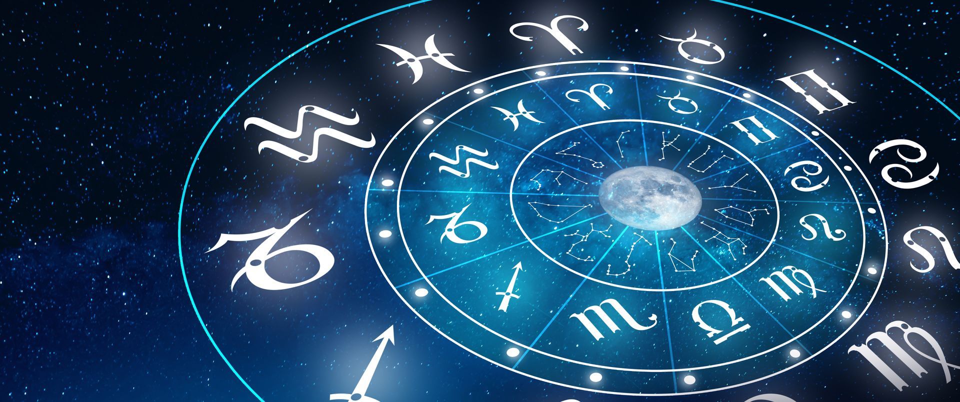 A person is holding a pendulum in their hand.
