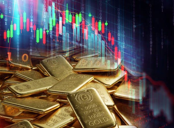 Gold bars with a stock chart overlay, indicating market fluctuations.