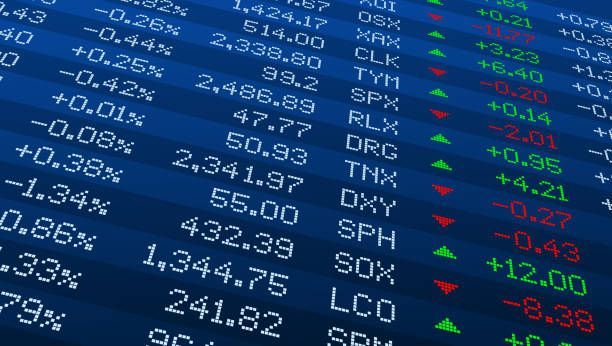 Stock market data display with fluctuating numbers, including green up arrows and red down arrows.