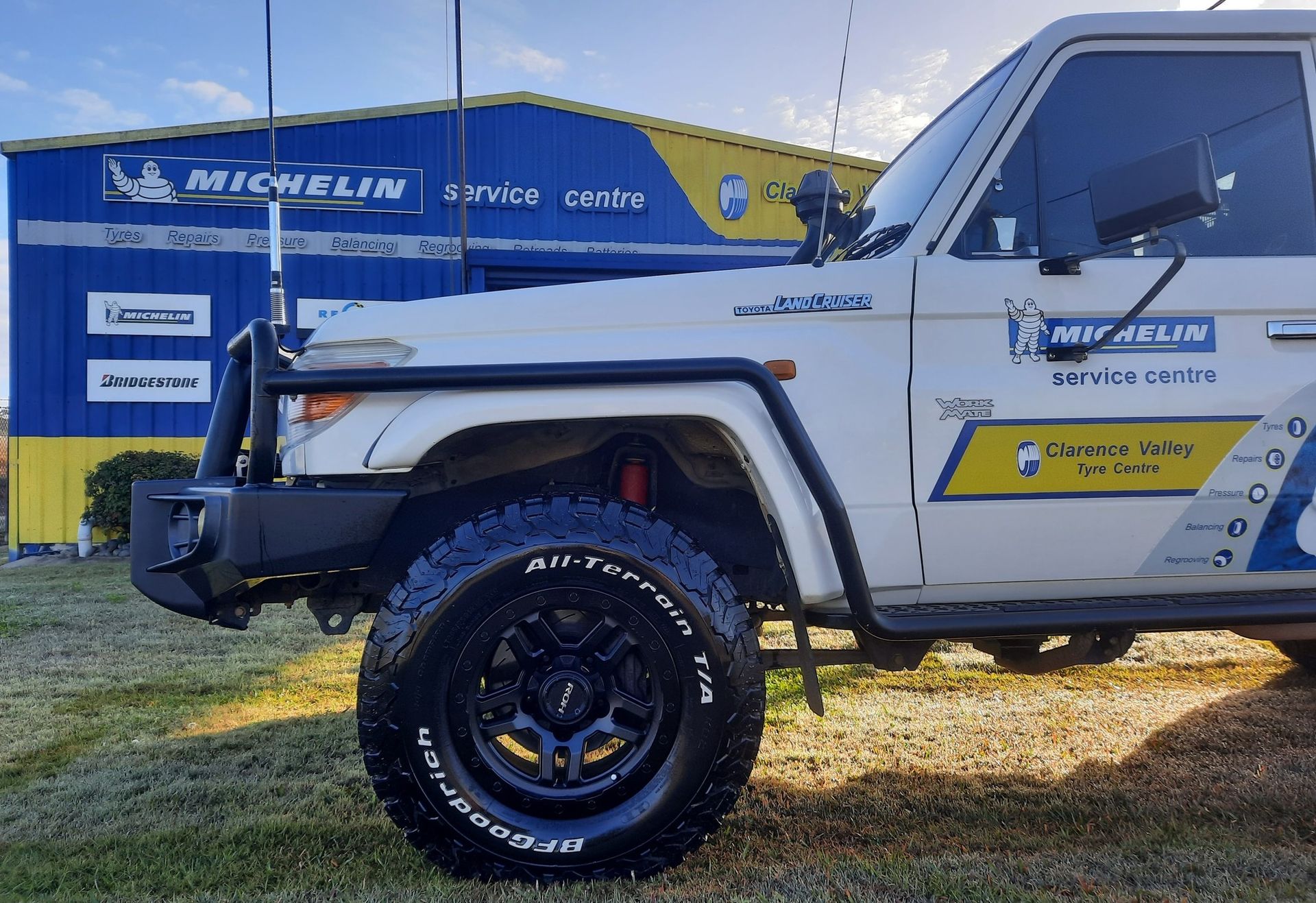 A White Truck Is Parked In Front Of A Building That Says Michelin — Clarence Valley Tyre Centre in South Grafton, NSW