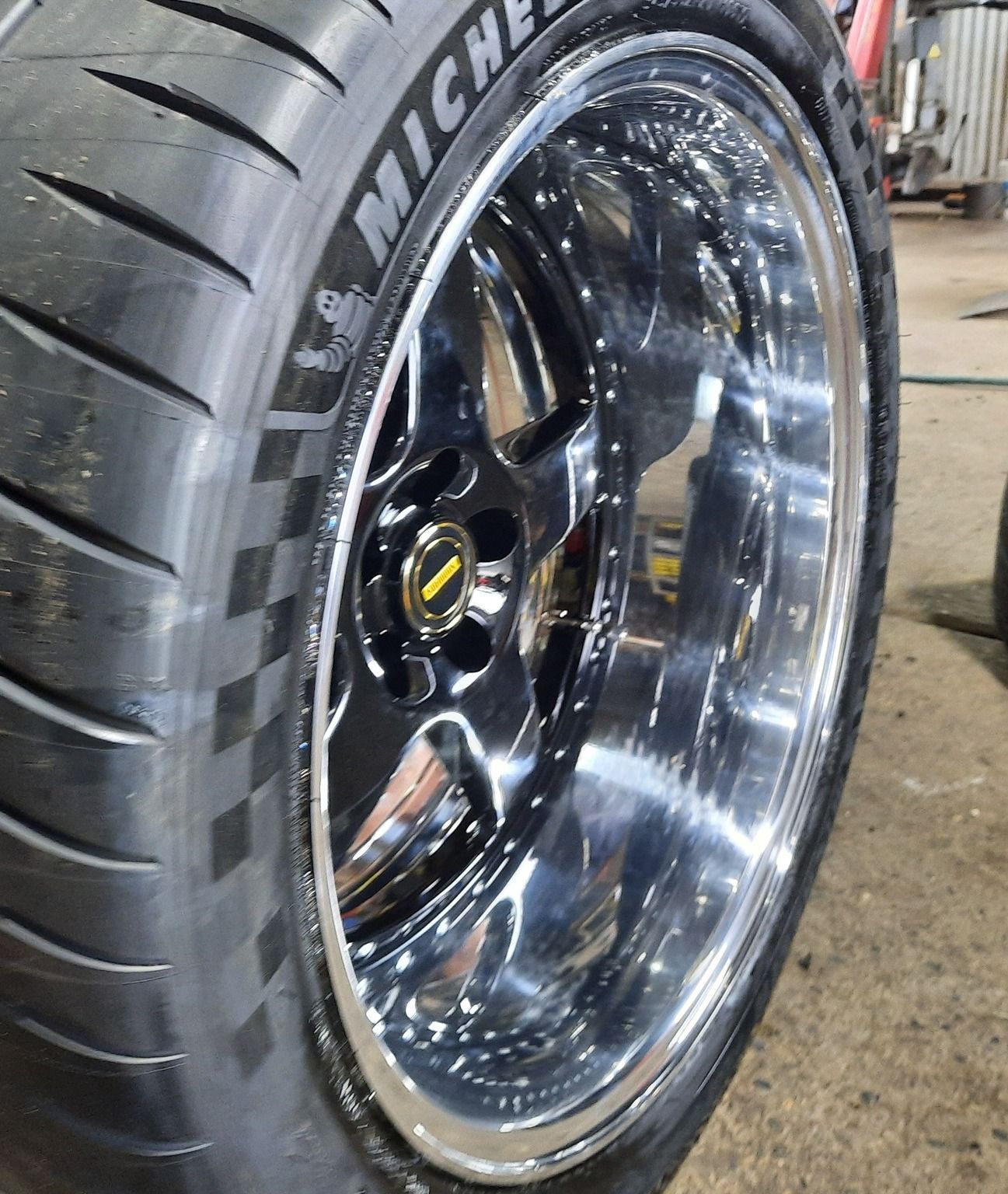 A Close Up Of A Michelin Tire With Chrome Rims — Clarence Valley Tyre Centre in South Grafton, NSW