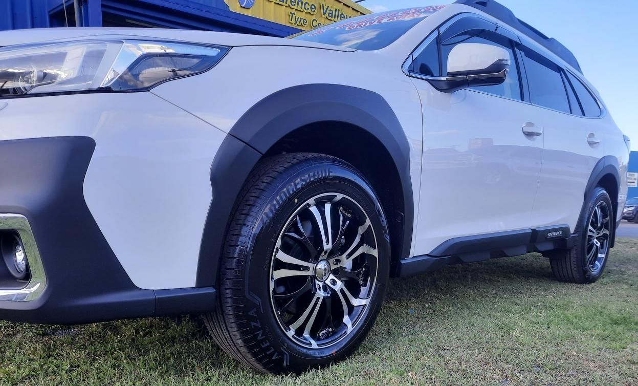 A White Truck Is Parked In Front Of A Michelin Service Centre — Clarence Valley Tyre Centre in South Grafton, NSW